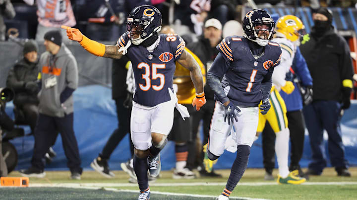 C.J. Gardner-Johnson (35) and Jaylon Johnson acknowledge the crowd at Soldier Field in the first Bears win over Green Bay.
