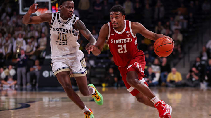 Feb 12, 2025; Atlanta, Georgia, USA; Stanford Cardinal guard Jaylen Blakes (21) dribbles past Georgia Tech Yellow Jackets forward Darrion Sutton (10) in the first half at McCamish Pavilion. Mandatory Credit: Brett Davis-Imagn Images