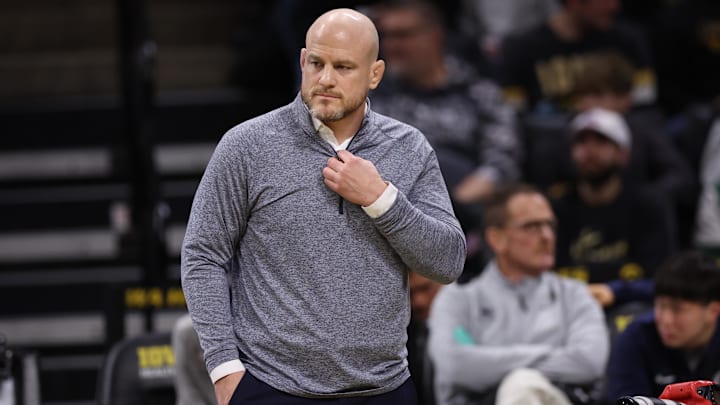 Penn State Nittany Lions wrestling coach Cael Sanderson watches his team wrestle the Iowa Hawkeyes at Carver-Hawkeye Arena. 