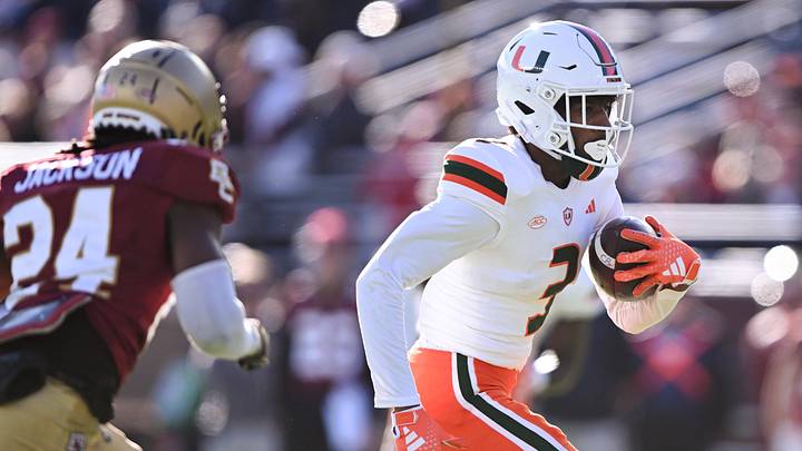 Nov 24, 2023; Chestnut Hill, Massachusetts, USA; Miami Hurricanes wide receiver Jacolby George (3) runs against the Boston College Eagles during the first half at Alumni Stadium. Mandatory Credit: Brian Fluharty-Imagn Images