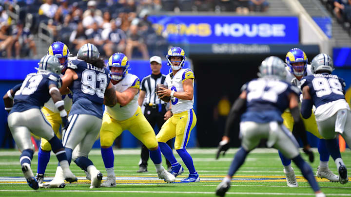 Aug 11, 2024; Inglewood, California, USA; Los Angeles Rams quarterback Stetson Bennett (13) drops back to pass against the Dallas Cowboys during the first half at SoFi Stadium. Mandatory Credit: Gary A. Vasquez-Imagn Images Aug 11, 2024; Inglewood, California, USA; Los Angeles Rams quarterback Stetson Bennett (13) drops back to pass against the Dallas Cowboys during the first half at SoFi Stadium. Mandatory Credit: Gary A. Vasquez-Imagn Images