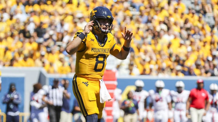 Aug 30, 2025; Morgantown, West Virginia, USA; West Virginia Mountaineers quarterback Nicco Marchiol (8) calls out a play during the first quarter against the Robert Morris Colonials at Milan Puskar Stadium. Mandatory Credit: Ben Queen-Imagn Images
