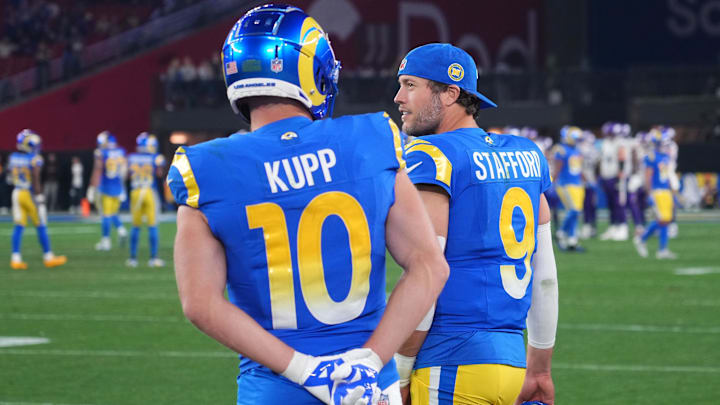 Jan 13, 2025; Glendale, AZ, USA; Los Angeles Rams quarterback Matthew Stafford (9) and wide receiver Cooper Kupp (10) watch from the sidelines against the Minnesota Vikings during the second half in an NFC wild card game at State Farm Stadium. Mandatory Credit: Joe Camporeale-Imagn Images Jan 13, 2025; Glendale, AZ, USA; Los Angeles Rams quarterback Matthew Stafford (9) and wide receiver Cooper Kupp (10) watch from the sidelines against the Minnesota Vikings during the second half in an NFC wild card game at State Farm Stadium. Mandatory Credit: Joe Camporeale-Imagn Images