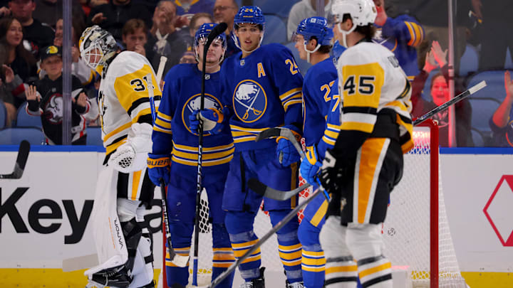 Sep 21, 2024; Buffalo, New York, USA;  Buffalo Sabres center Dylan Cozens (24) celebrates his goal with teammates during the third period against the Pittsburgh Penguins at KeyBank Center. Mandatory Credit: Timothy T. Ludwig-Imagn Images
