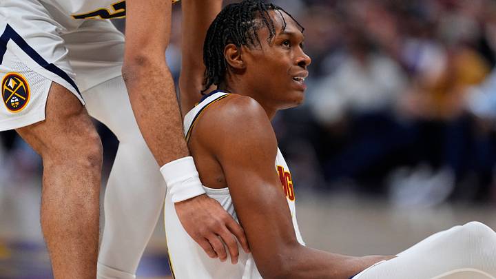 Jan 29, 2026; Denver, Colorado, USA; Denver Nuggets guard Peyton Watson (8) reacts on the court in the first quarter against the Brooklyn Nets at Ball Arena. Mandatory Credit: Ron Chenoy-Imagn Images