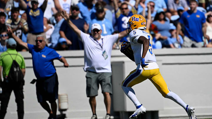 Oct 5, 2024; Chapel Hill, North Carolina, USA; Pittsburgh Panthers wide reciever Raphael Williams (5) scores a touchdown in the second quarter at Kenan Memorial Stadium. Mandatory Credit: Bob Donnan-Imagn Images Oct 5, 2024; Chapel Hill, North Carolina, USA; Pittsburgh Panthers wide reciever Raphael Williams (5) scores a touchdown in the second quarter at Kenan Memorial Stadium. Mandatory Credit: Bob Donnan-Imagn Images