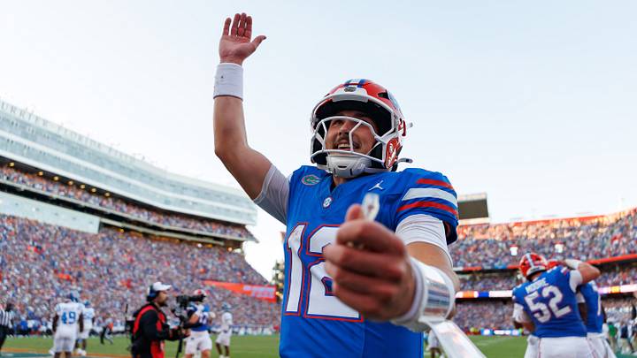 Sep 26, 2026; Gainesville, Florida, USA;  Florida Gators quarterback Aaron Philo (12) gestures after a touchdown against the Mississippi Rebels during the second half at Ben Hill Griffin Stadium.  Mandatory Credit: Matt Pendleton-Imagn Images