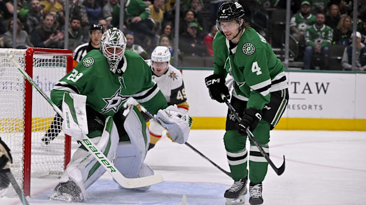 Jan 24, 2025; Dallas, Texas, USA; Dallas Stars goaltender Jake Oettinger (29) and defenseman Miro Heiskanen (4) in action during the game between the Dallas Stars and the Vegas Golden Knights at the American Airlines Center. Mandatory Credit: Jerome Miron-Imagn Images
