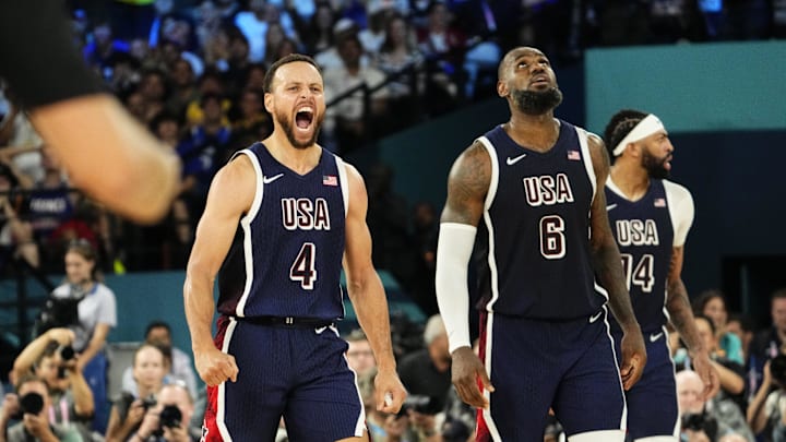 Aug 10, 2024; Paris, France; United States shooting guard Stephen Curry (4) and guard LeBron James (6) react in the second half against France in the men's basketball gold medal game during the Paris 2024 Olympic Summer Games at Accor Arena. Mandatory Credit: Rob Schumacher-Imagn Images Aug 10, 2024; Paris, France; United States shooting guard Stephen Curry (4) and guard LeBron James (6) react in the second half against France in the men's basketball gold medal game during the Paris 2024 Olympic Summer Games at Accor Arena. Mandatory Credit: Rob Schumacher-Imagn Images