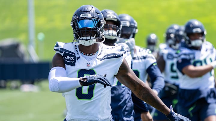 Jun 11, 2025; Renton, WA, USA; Seattle Seahawks defensive end DeMarcus Lawrence (0) takes part in drills during mini-camp at Virginia Mason Athletic Center. Mandatory Credit: Stephen Brashear-Imagn Images Jun 11, 2025; Renton, WA, USA; Seattle Seahawks defensive end DeMarcus Lawrence (0) takes part in drills during mini-camp at Virginia Mason Athletic Center. Mandatory Credit: Stephen Brashear-Imagn Images