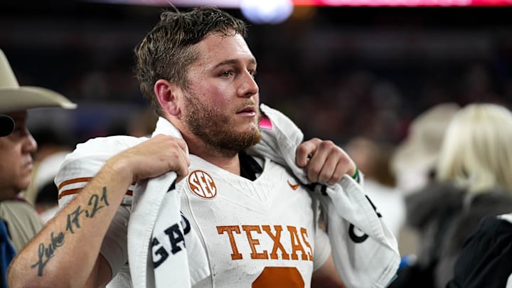 Texas Longhorns quarterback Quinn Ewers (3) looks into the crowd after the 28-14 loss to Ohio State in the College Football Playoff semifinal game in the Cotton Bowl at AT&T Stadium on Friday, Jan. 10, 2024 in Arlington, Texas. Texas Longhorns quarterback Quinn Ewers (3) looks into the crowd after the 28-14 loss to Ohio State in the College Football Playoff semifinal game in the Cotton Bowl at AT&T Stadium on Friday, Jan. 10, 2024 in Arlington, Texas.