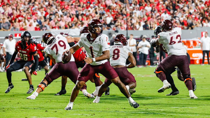 Sep 27, 2025; Raleigh, N.C.; Virginia Tech quarterback Kyron Drones (1) attempts to throw the ball during the first half. Sep 27, 2025; Raleigh, N.C.; Virginia Tech quarterback Kyron Drones (1) attempts to throw the ball during the first half.