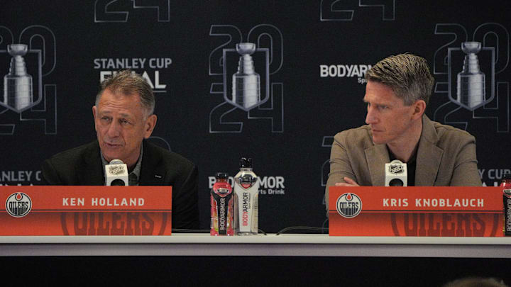 Jun 7, 2024; Sunrise, Florida, USA; Edmonton Oilers general manager Ken Holland, left, and head coach Kris Knoblauch take questions during media day in advance of the 2024 Stanley Cup Final at Amerant Bank Arena. Mandatory Credit: Jim Rassol-Imagn Images