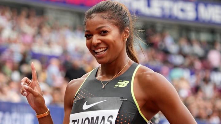 Gabby Thomas poses after winning the women's 200m in a meet record 21.82. Gabby Thomas poses after winning the women's 200m in a meet record 21.82.