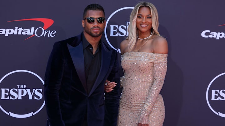 Russell Wilson (left) and wife Ciara pose on the ESPYs red carpet at the Dolby Theatre.