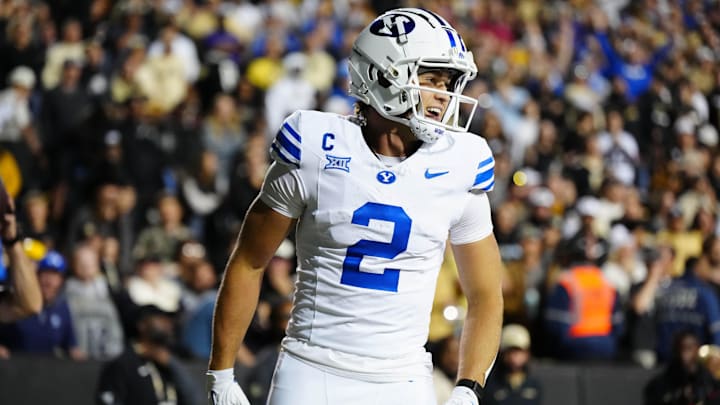 Sep 27, 2025; Boulder, Colorado, USA; Brigham Young Cougars wide receiver Chase Roberts (2) reacts to his touchdown reception in the third quarter against the Colorado Buffaloes at Folsom Field. Mandatory Credit: Ron Chenoy-Imagn Images