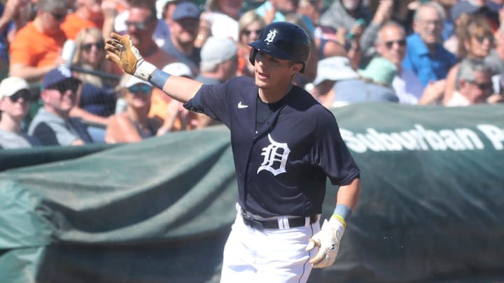 Detroit Tigers infielder Nick Maton (9) homers against the Baltimore Orioles during Grapefruit League play in Spring Training.