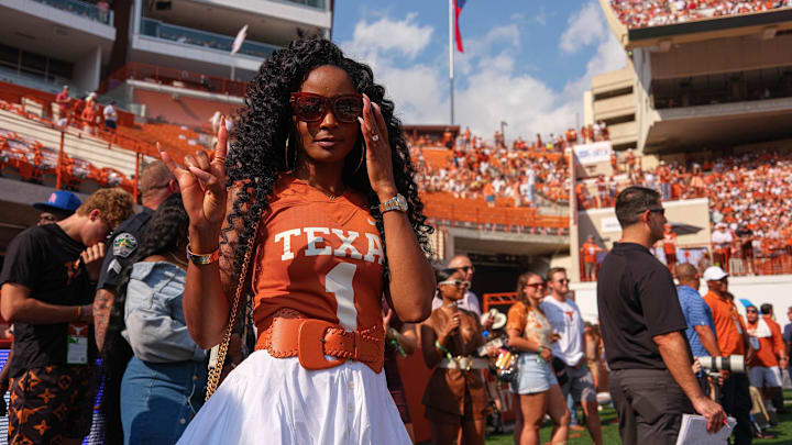 Sep 10, 2022; Austin, TX, USA; Loreal Sarkisian, wife of Texas head coach Steve Sarkisian, holds up the sign of the horns in the endzone before the game at Royal Memorial Stadium on Sep. 10, 2022. Mandatory Credit: Sep 10, 2022; Austin, TX, USA; Loreal Sarkisian, wife of Texas head coach Steve Sarkisian, holds up the sign of the horns in the endzone before the game at Royal Memorial Stadium on Sep. 10, 2022. Mandatory Credit: