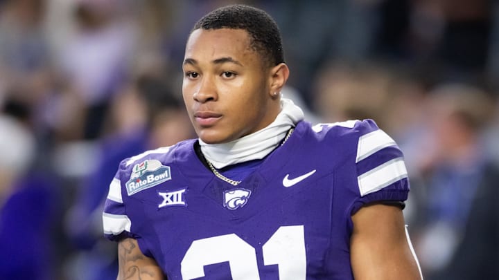 Dec 26, 2024; Phoenix, AZ, USA; Kansas State Wildcats safety Marques Sigle (21) against the Rutgers Scarlet Knights during the Rate Bowl at Chase Field. Mandatory Credit: Mark J. Rebilas-Imagn Images