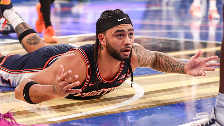 Nov 28, 2025; New York, New York, USA;  Illinois Fighting Illini guard Kylan Boswell (4) reacts after getting fouled in the second half against the UConn Huskies at Madison Square Garden. Mandatory Credit: Wendell Cruz-Imagn Images