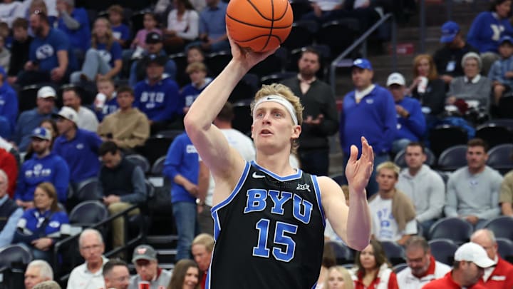Nov 21, 2025; Salt Lake City, Utah, USA; BYU Cougars guard Richie Saunders (15) warms up before the game against the Wisconsin Badgers at Delta Center. Mandatory Credit: Rob Gray-Imagn Images
