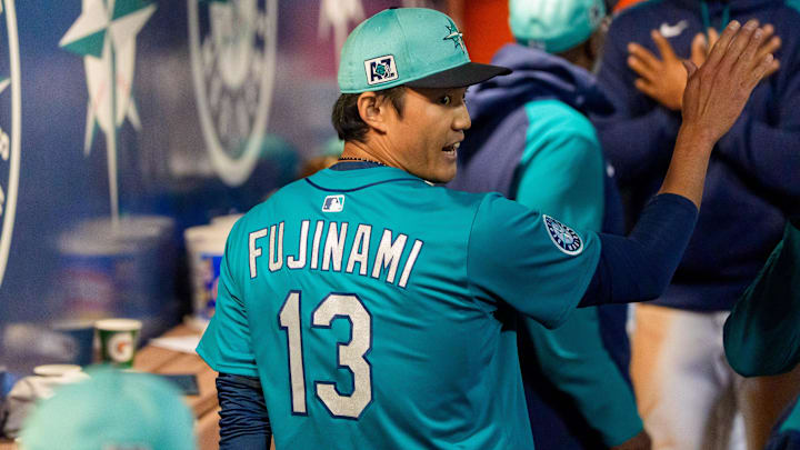 Seattle Mariners pitcher Shintaro Fujinami celebrates after a scoreless inning against the Los Angeles Angels on March 7 at Peoria Sports Complex.