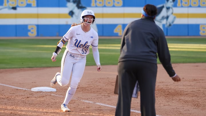UCLA's Kaitlyn Terry hits her first career home run, a grand slam, against Ohio State on April 4, 2025.