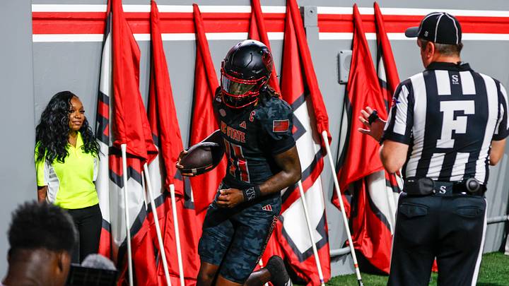 Sep 11, 2026; Raleigh, North Carolina, USA; NC State Wolfpack quarterback CJ Bailey (11) celebrates a touchdown during the first half of the game against Richmond Spiders at Carter-Finley Stadium. Mandatory Credit: Jaylynn Nash-Imagn Images Sep 11, 2026; Raleigh, North Carolina, USA; NC State Wolfpack quarterback CJ Bailey (11) celebrates a touchdown during the first half of the game against Richmond Spiders at Carter-Finley Stadium. Mandatory Credit: Jaylynn Nash-Imagn Images