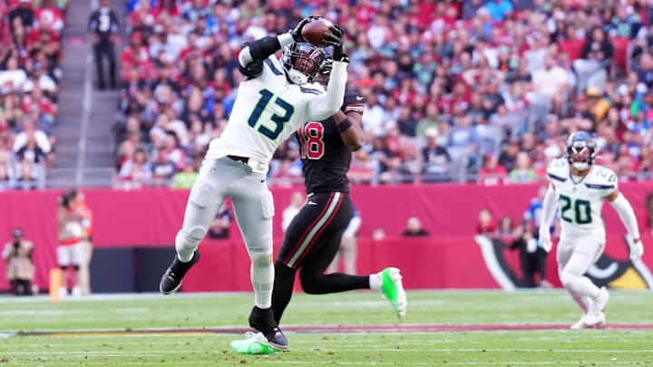Dec 8, 2024; Glendale, Arizona, USA; Seattle Seahawks linebacker Ernest Jones IV (13) intercepts a pass against the Arizona Cardinals during the first half at State Farm Stadium. Mandatory Credit: Joe Camporeale-Imagn Images