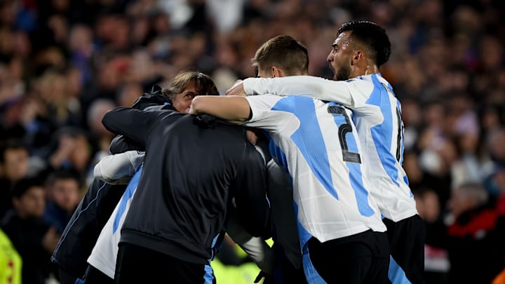 Thiago Almada of Argentina and his teammates celebrates...