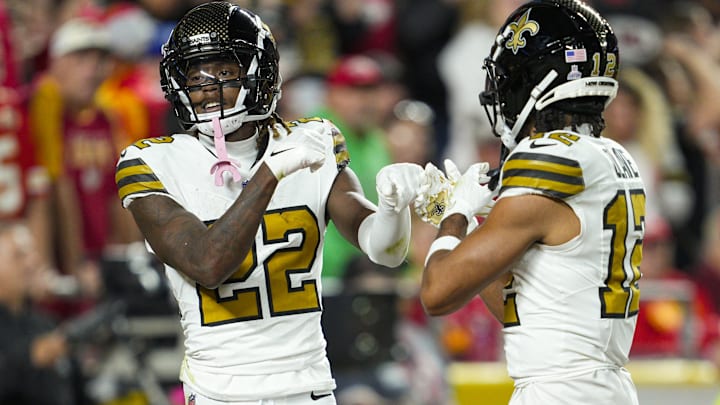 Oct 7, 2024; Kansas City, Missouri, USA; New Orleans Saints wide receiver Rashid Shaheed (22) celebrates with wide receiver Chris Olave (12) after scoring a touchdown during the first half against the Kansas City Chiefs at GEHA Field at Arrowhead Stadium.