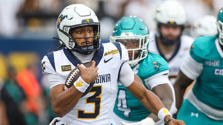 Sep 5, 2026; Morgantown, West Virginia, USA;  West Virginia Mountaineers quarterback Michael Hawkins Jr. (3) runs the ball during the first quarter against the Coastal Carolina Chanticleers at Milan Puskar Stadium.  Mandatory Credit: Ben Queen-Imagn Images