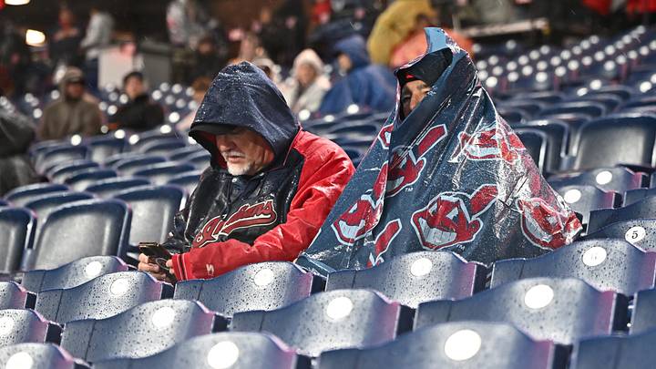 Oct 16, 2026; Cleveland, Ohio, USA; Fans sit in the stands while they wait out a rain delay before game four of the ALCS between Tampa Bay Rays and Cleveland Guardians in the 2026 MLB Playoffs at Progressive Field. Mandatory Credit: Ken Blaze-Imagn Images Oct 16, 2026; Cleveland, Ohio, USA; Fans sit in the stands while they wait out a rain delay before game four of the ALCS between Tampa Bay Rays and Cleveland Guardians in the 2026 MLB Playoffs at Progressive Field. Mandatory Credit: Ken Blaze-Imagn Images