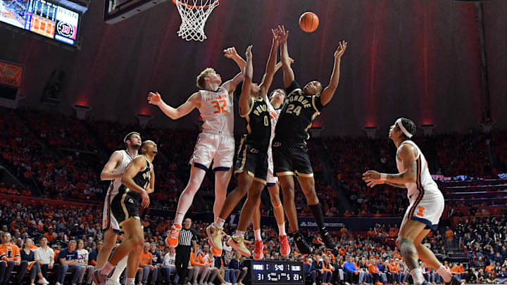 Illinois Fighting Illini and Purdue Boilermakers fight for a rebound 