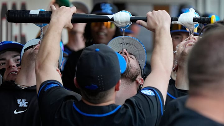 Kentucky celebrates after scoring three runs during a NCAA baseball game against Georgia on March 14, 2025.