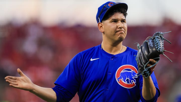 Jun 6, 2024; Cincinnati, Ohio, USA; Chicago Cubs starting pitcher Javier Assad (72) walks off the field during a pitching change in the sixth inning against the Cincinnati Reds at Great American Ball Park