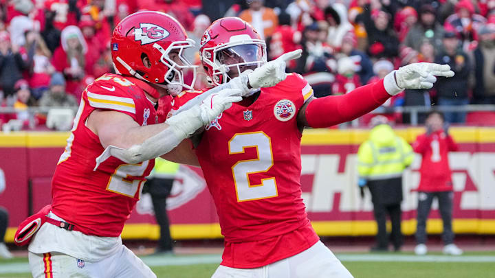 Dec 21, 2024; Kansas City, Missouri, USA; Kansas City Chiefs cornerback Joshua Williams (2) celebrates with linebacker Drue Tranquill (23) after a sack against the Houston Texans during the second half at GEHA Field at Arrowhead Stadium. Mandatory Credit: Denny Medley-Imagn Images