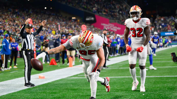 Oct 10, 2024; Seattle, Washington, USA; San Francisco 49ers tight end George Kittle (85) spikes the ball after scoring a touchdown against the Seattle Seahawks during the second half at Lumen Field. Mandatory Credit: Steven Bisig-Imagn Images Oct 10, 2024; Seattle, Washington, USA; San Francisco 49ers tight end George Kittle (85) spikes the ball after scoring a touchdown against the Seattle Seahawks during the second half at Lumen Field. Mandatory Credit: Steven Bisig-Imagn Images