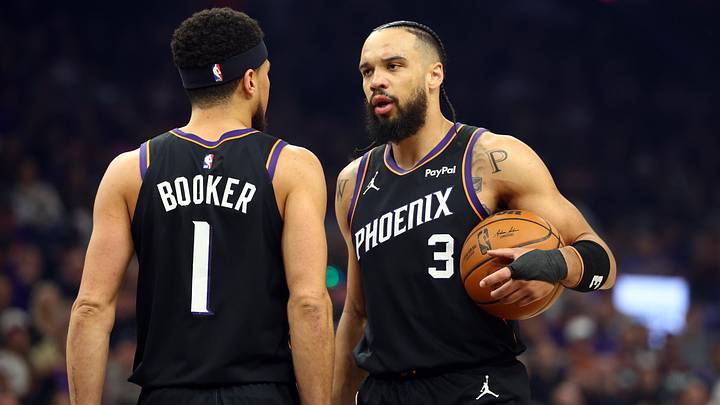 Apr 14, 2026; Phoenix, Arizona, USA; Phoenix Suns forward Dillon Brooks (3) with guard Devin Booker (1) against the Portland Trail Blazers in the first half during the play-in rounds of the 2026 NBA Playoffs at Mortgage Matchup Center. Mandatory Credit: Mark J. Rebilas-Imagn Images
Apr 14, 2026; Phoenix, Arizona, USA; Phoenix Suns forward Dillon Brooks (3) with guard Devin Booker (1) against the Portland Trail Blazers in the first half during the play-in rounds of the 2026 NBA Playoffs at Mortgage Matchup Center. Mandatory Credit: Mark J. Rebilas-Imagn Images