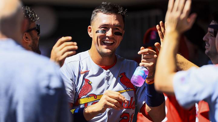Aug 31, 2025; Cincinnati, Ohio, USA; St. Louis Cardinals outfielder Lars Nootbaar (21) high fives teammates after scoring on a sacrifice fly out hit by designated hitter Ivan Herrera (not pictured) in the third inning against the Cincinnati Reds at Great American Ball Park. Mandatory Credit: Katie Stratman-Imagn Images
