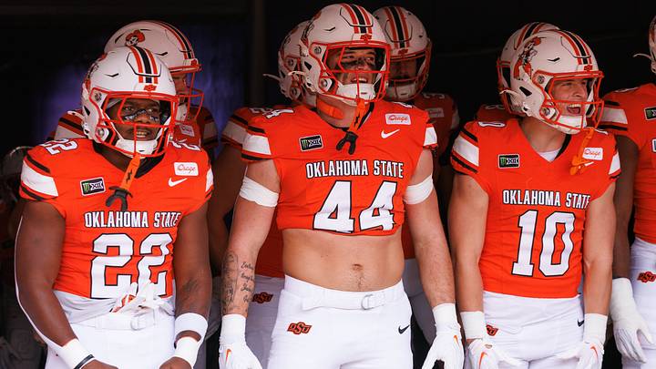 Oklahoma State Cowboys running back William Mason (22), tight end Carson Kolb (44) and wide receiver Wyatt Young. Oklahoma State Cowboys running back William Mason (22), tight end Carson Kolb (44) and wide receiver Wyatt Young.