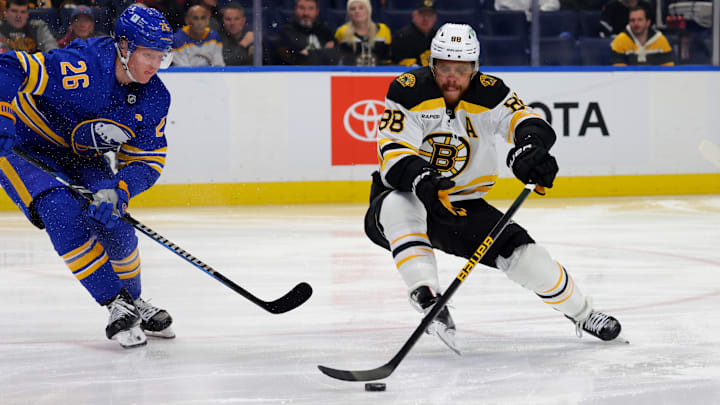Buffalo Sabres defenseman Rasmus Dahlin and Boston Bruins forward David Pastrnak