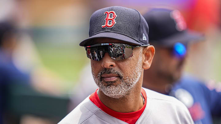Jun 1, 2025; Cumberland, Georgia, USA; Boston Red Sox manager Alex Cora (13) shown in the dugout before the game against the Atlanta Braves at Truist Park. Mandatory Credit: Dale Zanine-Imagn Images