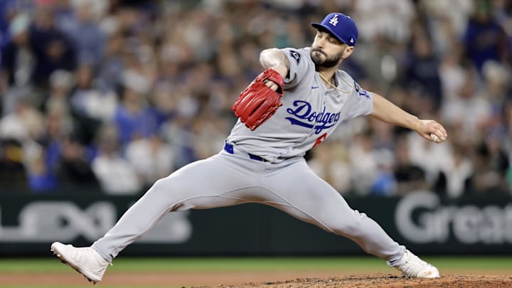 Sep 26, 2025; Seattle, Washington, USA; Los Angeles Dodgers pitcher Tanner Scott (66) throws against the Seattle Mariners during the ninth inning at T-Mobile Park. Mandatory Credit: John Froschauer-Imagn Images