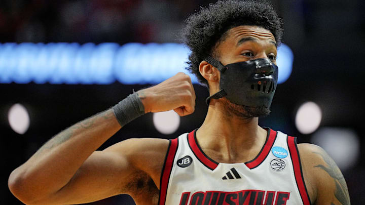 Mar 20, 2025; Lexington, KY, USA; Louisville Cardinals forward James Scott (0) reacts during the first half against the Creighton Bluejays in the first round of the NCAA Tournament at Rupp Arena. Mandatory Credit: Aaron Doster-Imagn Images