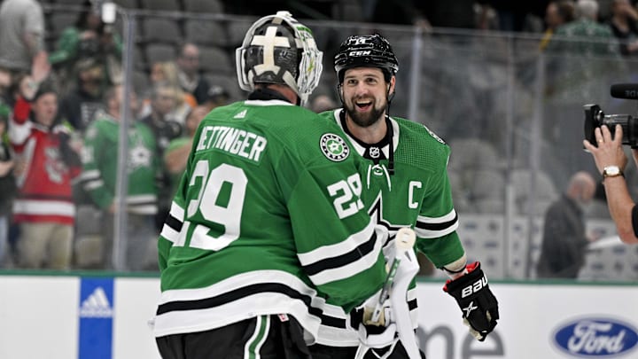Apr 6, 2023; Dallas, Texas, USA; Dallas Stars goaltender Jake Oettinger (29) and left wing Jamie Benn (14) celebrate after the Stars victory over the Philadelphia Flyers at the American Airlines Center. Mandatory Credit: Jerome Miron-Imagn Images Apr 6, 2023; Dallas, Texas, USA; Dallas Stars goaltender Jake Oettinger (29) and left wing Jamie Benn (14) celebrate after the Stars victory over the Philadelphia Flyers at the American Airlines Center. Mandatory Credit: Jerome Miron-Imagn Images