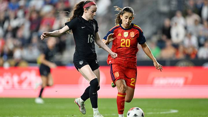 Rose Lavelle battling for the ball with Spain's Clara Pinedo during the USWNT's friendly against Spain. Rose Lavelle battling for the ball with Spain's Clara Pinedo during the USWNT's friendly against Spain.