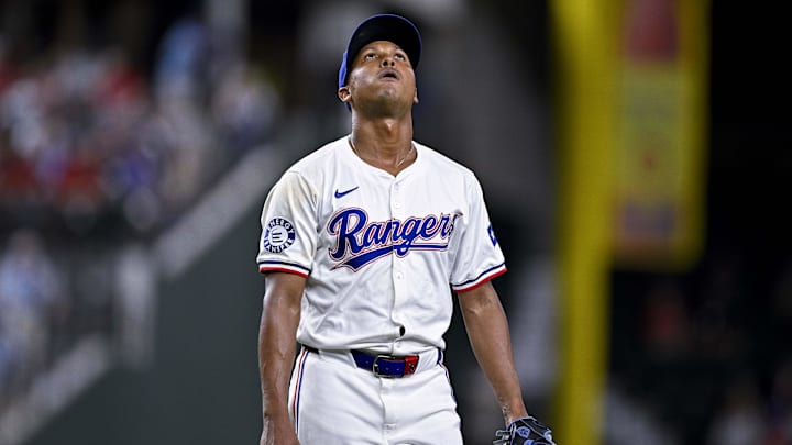 Aug 15, 2024; Arlington, Texas, USA; Texas Rangers relief pitcher Jose Leclerc (25) reacts a call during the game against the Minnesota Twins at Globe Life Field.