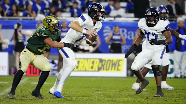 Basha defensive end Caleb Jordan (35) sacks Chandler quarterback Will Mencl (7) during the Open state championship at Mountain America Stadium in Tempe on Dec. 6, 2025.