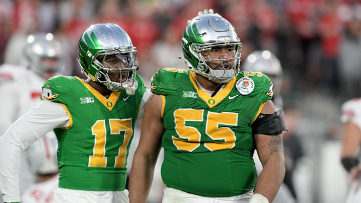 Jan 1, 2025; Pasadena, CA, USA; Oregon Ducks defensive lineman Derrick Harmon (55) reacts in the second half against the Ohio State Buckeyes in the 2025 Rose Bowl college football quarterfinal game at Rose Bowl Stadium. Mandatory Credit: Kirby Lee-Imagn Images Jan 1, 2025; Pasadena, CA, USA; Oregon Ducks defensive lineman Derrick Harmon (55) reacts in the second half against the Ohio State Buckeyes in the 2025 Rose Bowl college football quarterfinal game at Rose Bowl Stadium. Mandatory Credit: Kirby Lee-Imagn Images